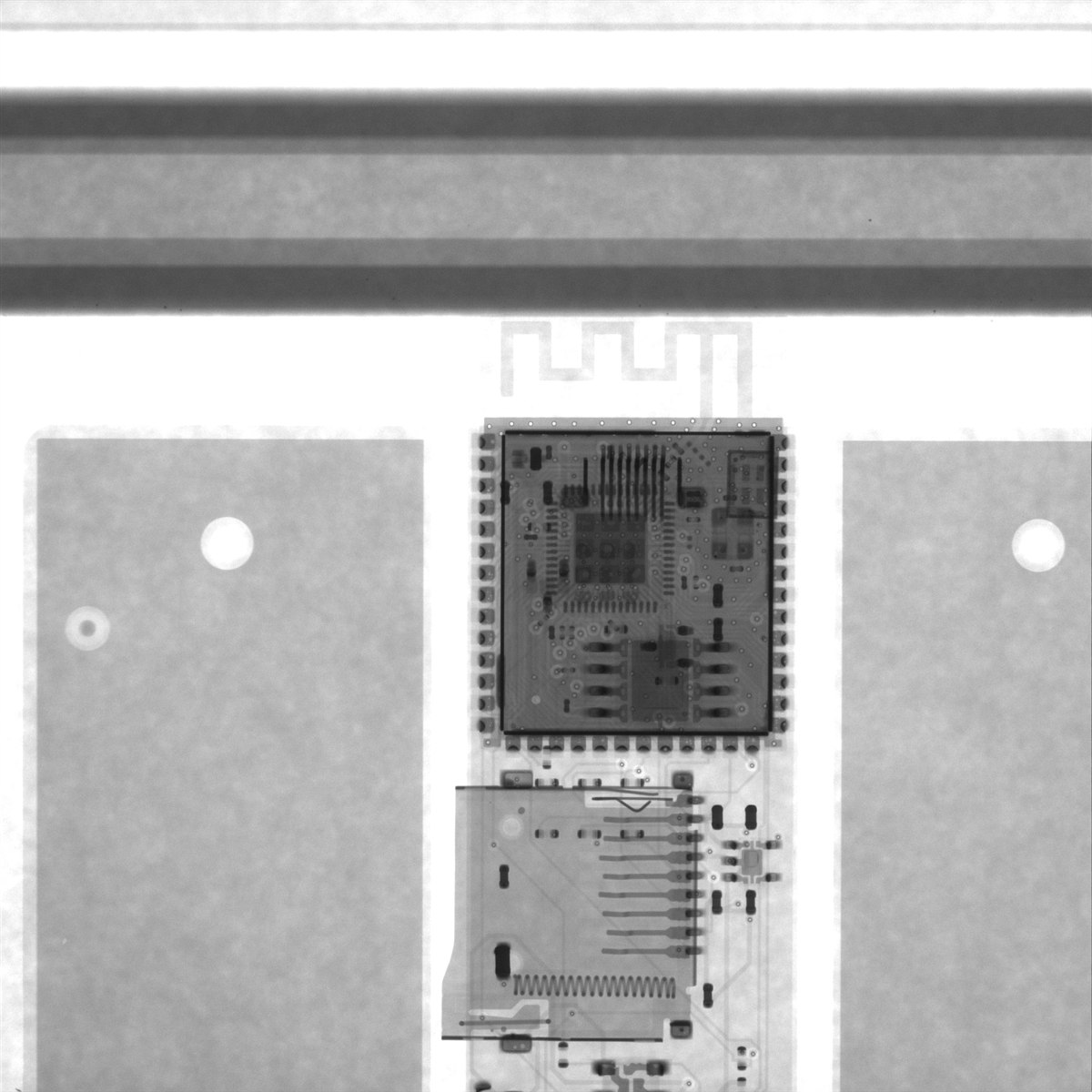 Factory X-ray inspection image showing the assembled USB Army Knife PCB, processor module, solder joints and internal copper traces